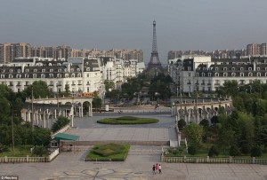 Image from http://www.dailymail.co.uk/news/article-2384036/Inside-Chinas-mini-Paris-Town-built-look-just-like-French-capital-complete-Eiffel-Tower-Champs-Elys-es.html